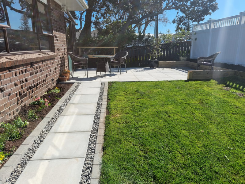 Paved patio, path all raised to flow with easy access. 